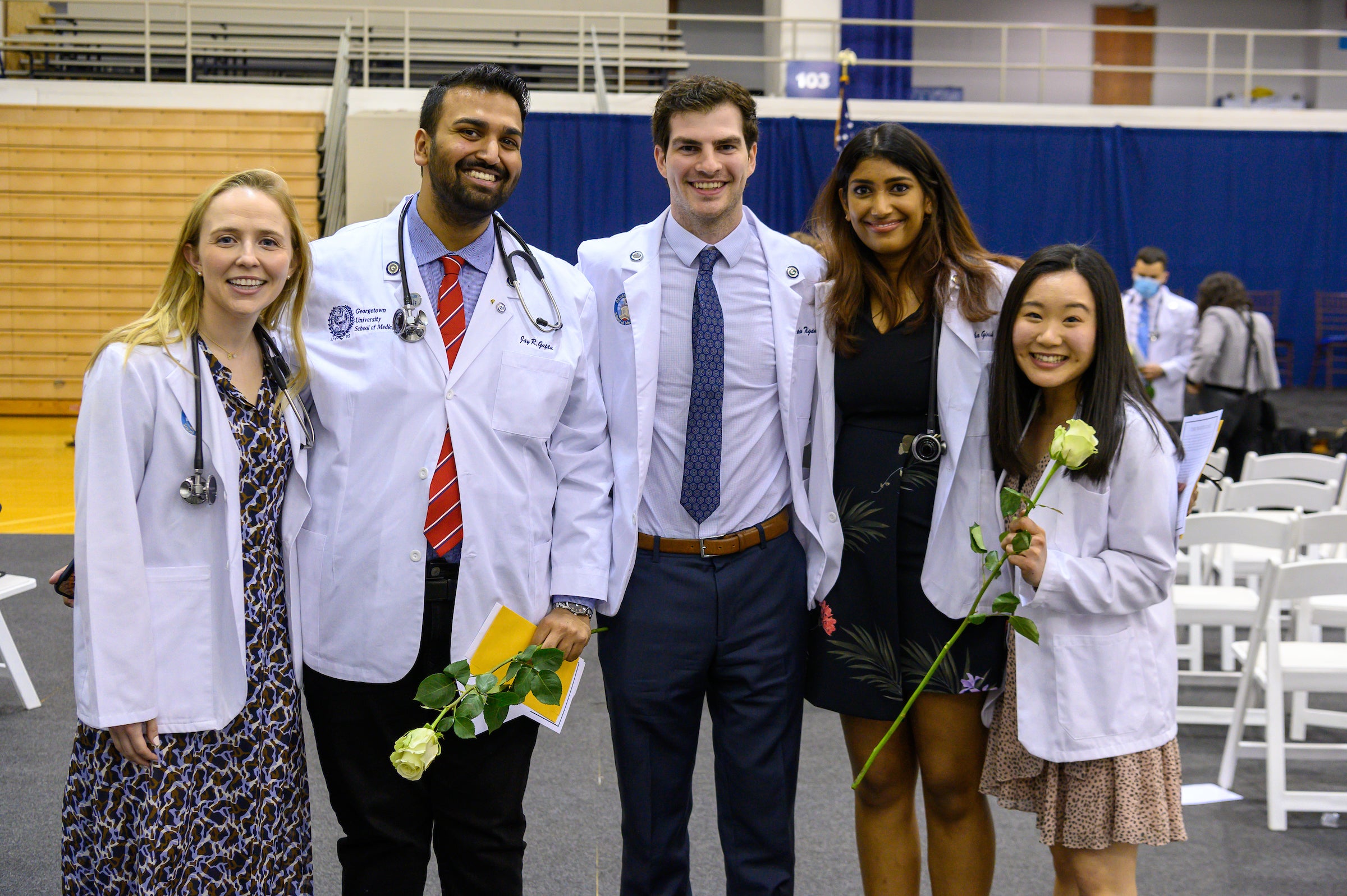 students in white lab coats
